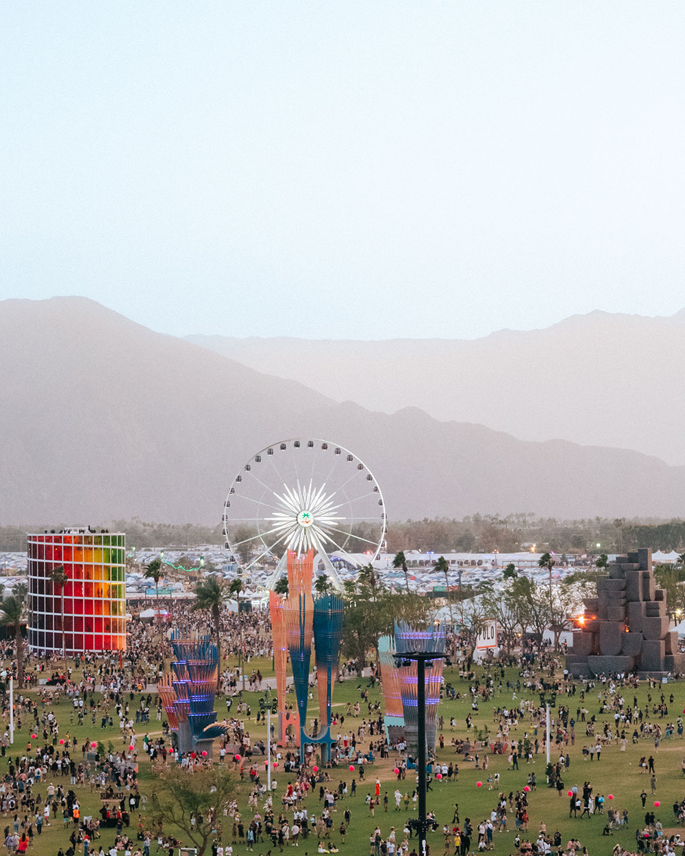 wide shot of Coachella grounds against mountains backdrop